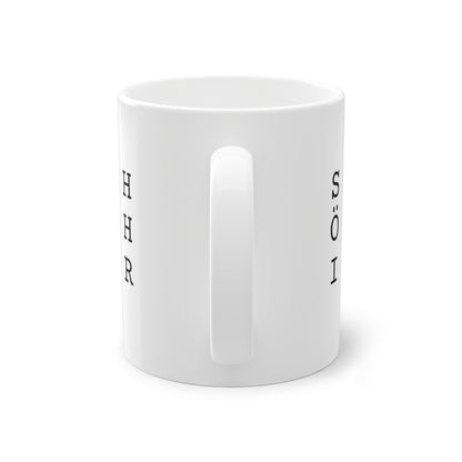 Weisse Design Tasse "Schön hier"